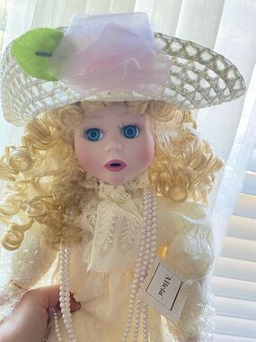 The Ashton-Drake Galleries Porcelain Doll in Cream Lace Dress

In original box